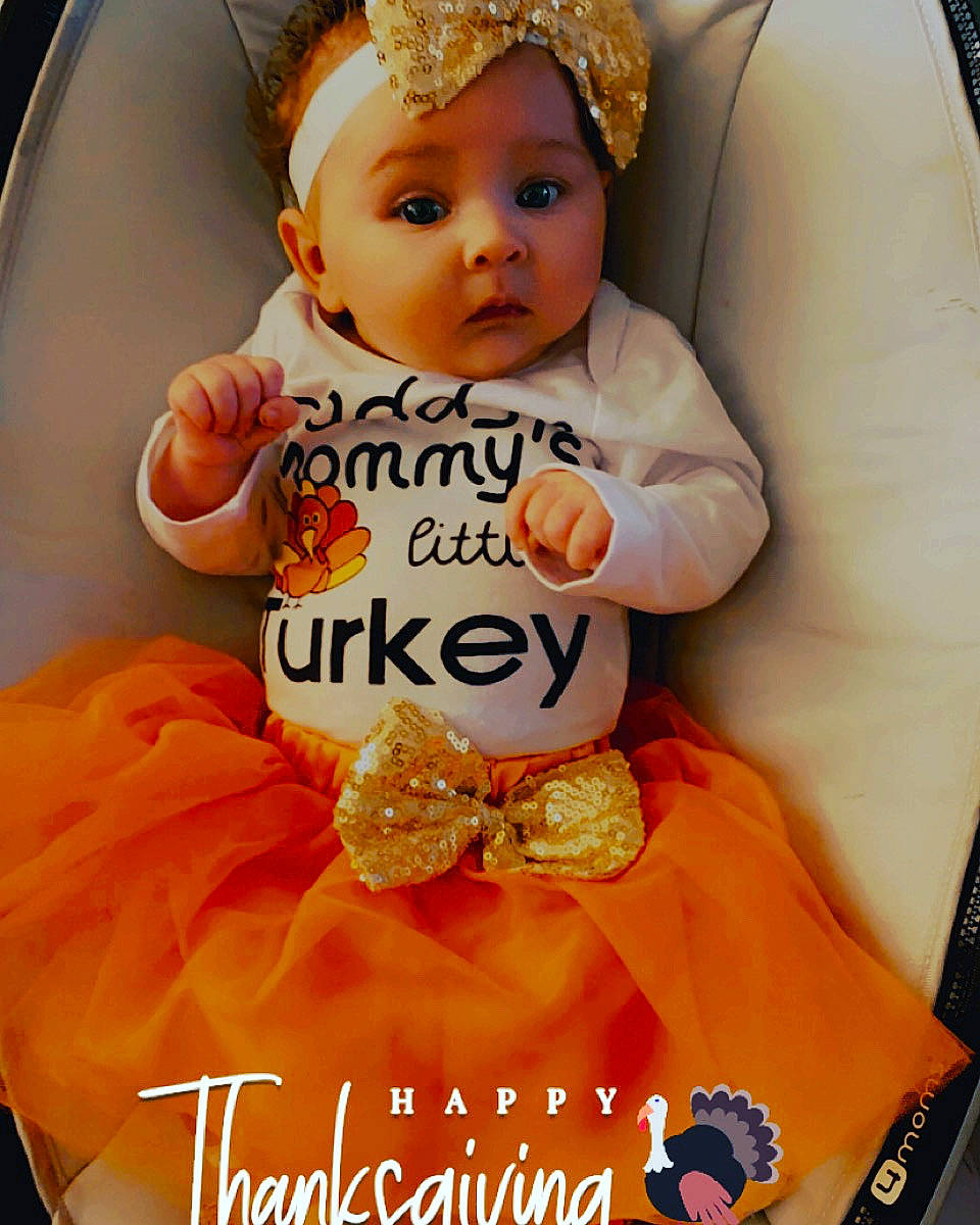 Caylee is registered to the contest to win money with this photo: baby, baby_products, baby_toddler_clothing, child, eyelash, fashion_accessory, font, fun, happy, headband, headpiece, jewellery, logo, necklace, orange, peach, person, surprise, sweetness, tiara