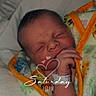 Neyland is registered to the contest to win money with this photo: newborn, baby, sleeping, blanket, hospital_bracelet, infant, closeup, bed, wrapped, cute, peaceful, skin, hand, face, rest, indoors, soft, child, portrait, toddler