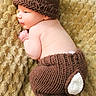 Neyland joined the competition — help win amazing prizes! baby, infant, knitted_hat, knitted_pants, bunny_costume, ears, tail, blanket, texture, soft, cute, sleeping, resting, portrait, side_view, indoor, child, newborn, cozy, warm