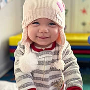 Mavie joined the competition — help win amazing prizes! baby, babylaughing, beanie, bodypart, bonnet, cap, clothing, coat, face, happy, hat, head, hood, jacket, knitwear, person, photography, portrait, smile, sweater