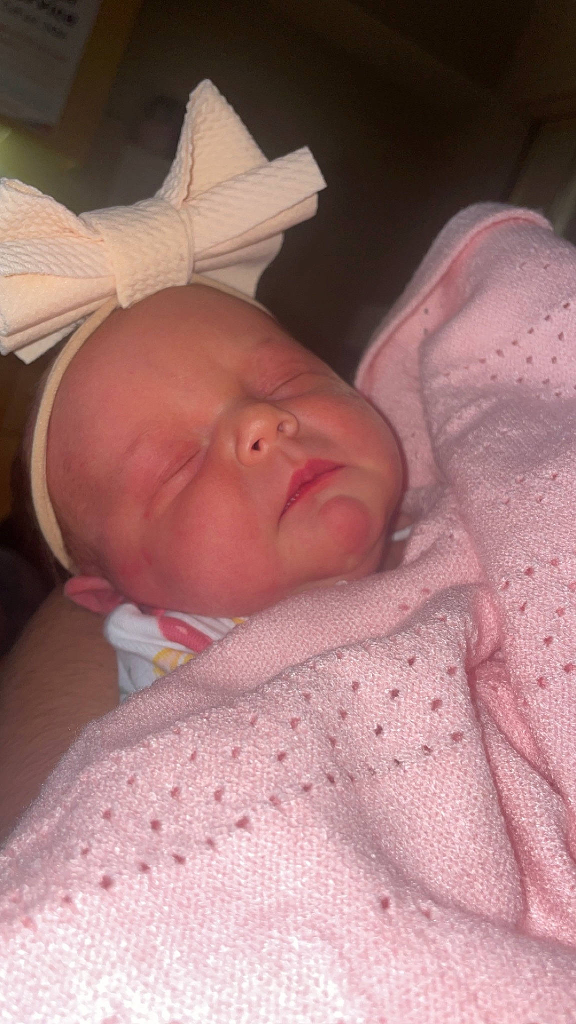 Donna is registered to the contest to win money with this photo: baby, baby_toddler_clothing, cheek, child, chin, comfort, ear, eye, eyebrow, face, forehead, head, iris, linens, lip, mouth, nose, person, pink, skin