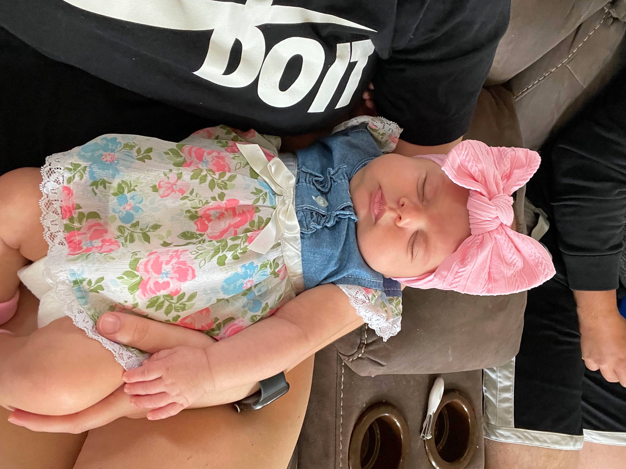 Hazel Grace is registered to the contest to win money with this photo: auto_part, baby, baby_carriage, baby_products, baby_toddler_clothing, child, fun, happy, hat, headwear, human, human_leg, knee, lap, nail, person, pink, product, sitting, t_shirt