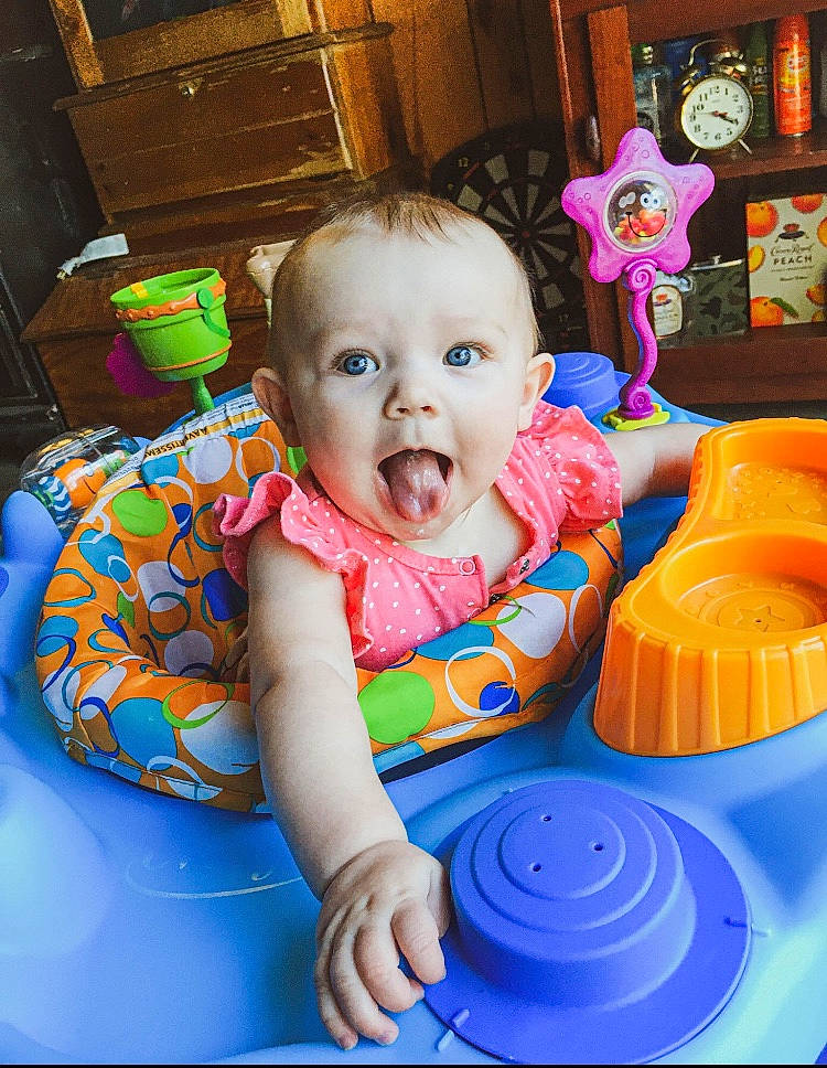 Iyanna joined the competition — help win amazing prizes! baby, baby_playing_with_food, baby_products, baby_toddler_clothing, baby_toys, bib, cabinetry, child, person, picture_frame, plastic, play, shelf, sweetness, toddler
