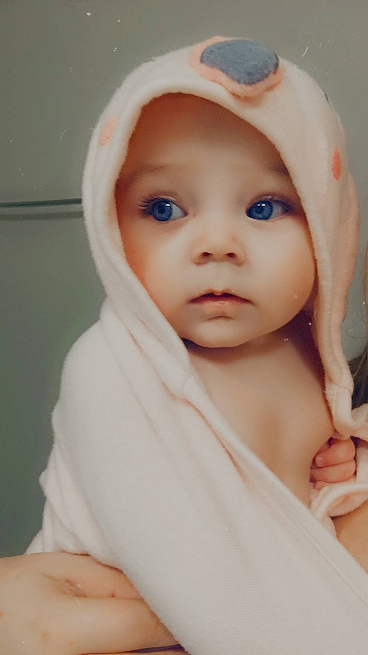 Iyanna joined the competition — help win amazing prizes! baby, baby_toddler_clothing, cheek, child, comfort, eyebrow, finger, flesh, headwear, hood, linens, lip, nail, nose, person, portrait_photography, skin, toddler