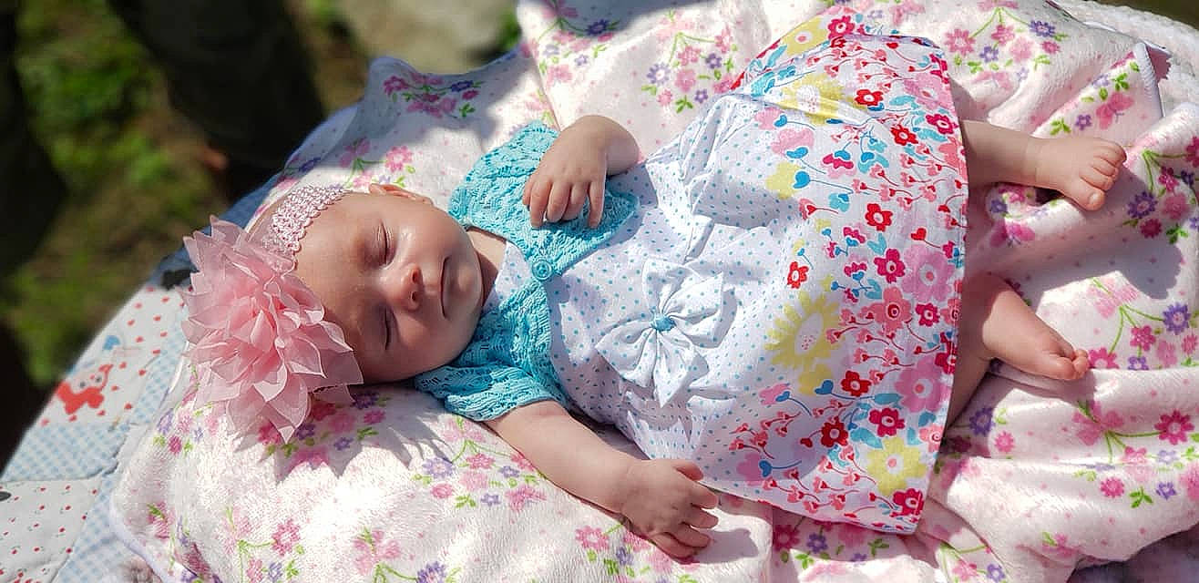 Jacelynn is registered to the contest to win money with this photo: baby, bedtime, birth, child, headwear, nap, person, pink, sleep, textile, toddler