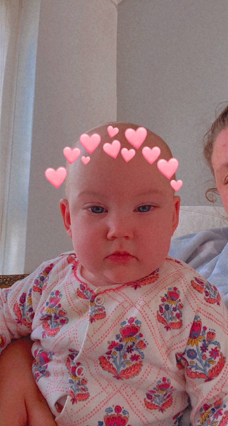 Poppy is registered to the contest to win money with this photo: baby, baby_toddler_clothing, cheek, ear, eye, eyebrow, eyelash, face, forehead, head, headgear, lip, neck, nose, person, pink, red, skin, sleeve, textile