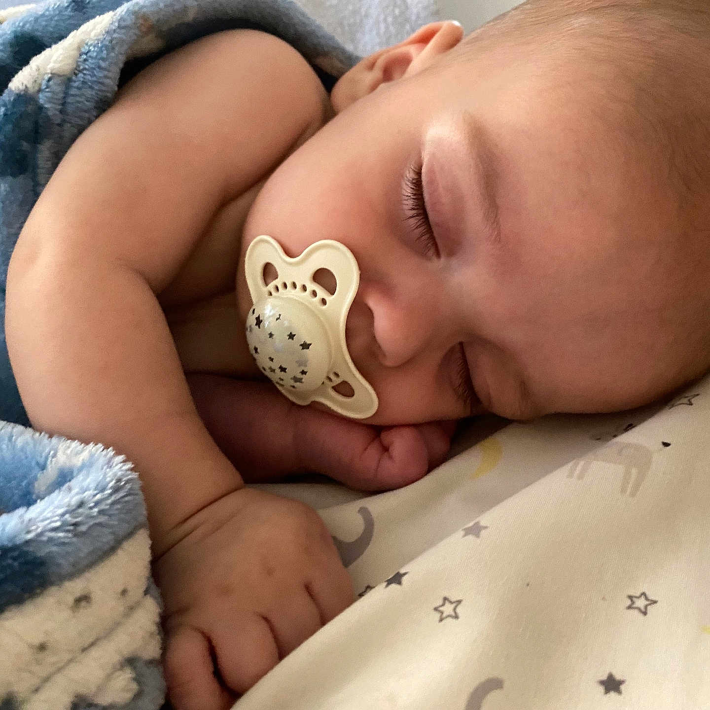 Leon joined the competition — help win amazing prizes! baby, blanket, face, head, newborn, person, photography, portrait, quilt, sleeping, yawning