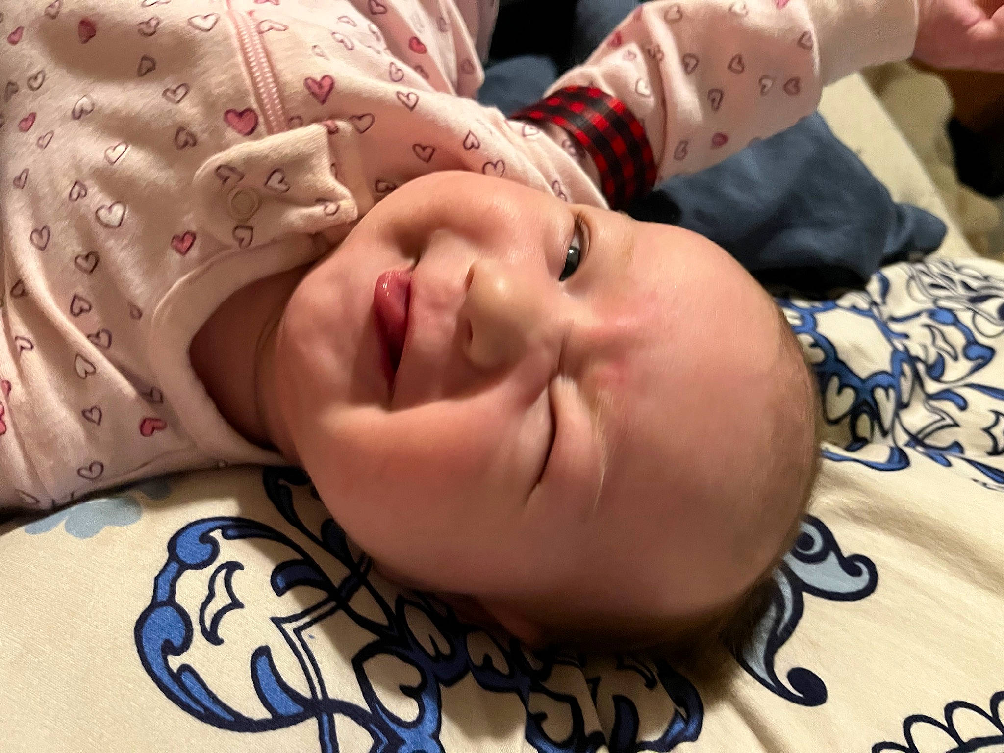 Adrianne is registered to the contest to win money with this photo: baby, cheek, child, chin, comfort, eyebrow, eyelash, finger, happy, linens, lip, mouth, muscle, neck, nose, pattern, person, skin, smile, textile