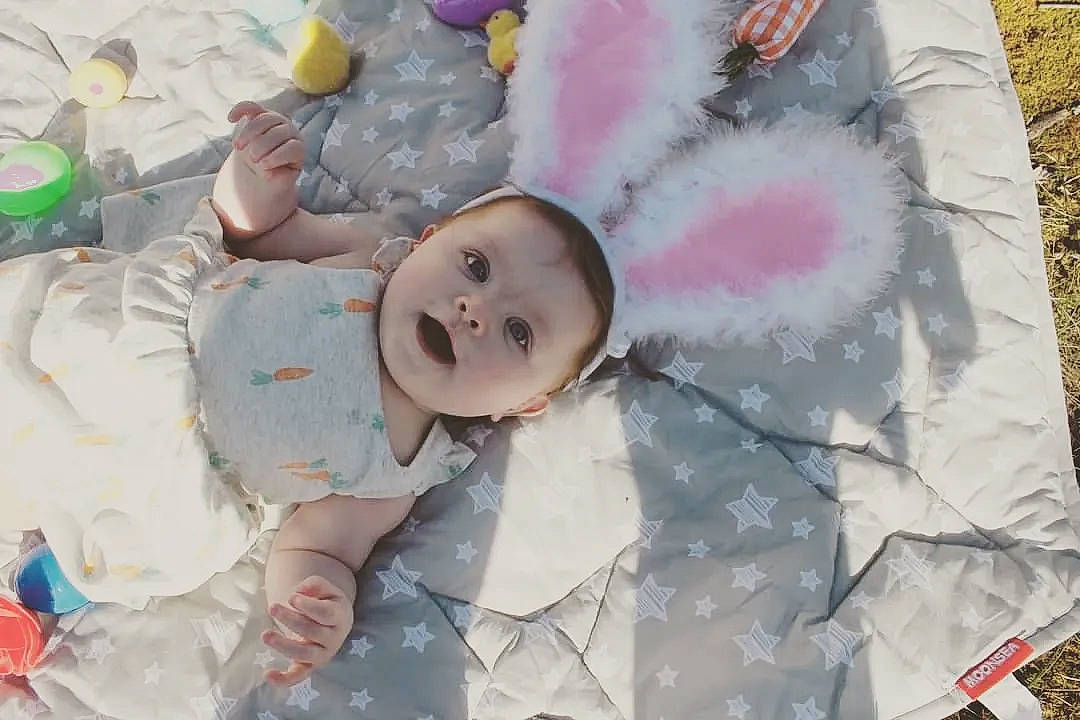 Evelyn Grace is registered to the contest to win money with this photo: art, baby, baby_products, baby_toddler_clothing, baby_toys, bedding, cheek, child, linens, pattern, person, pink, plastic, plush, product, room, stuffed_toy, textile, toddler, toy