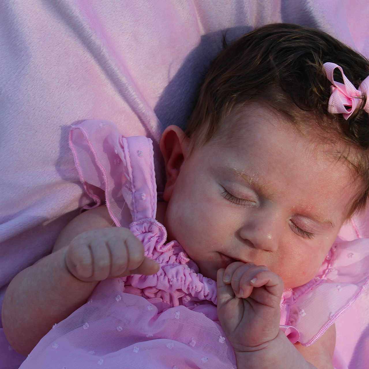 Emmy is registered to the contest to win money with this photo: accessories, baby, blanket, bodypart, bonnet, clothing, face, finger, furniture, hand, hat, head, headband, newborn, person, photography, portrait, purple, sleeping, towel