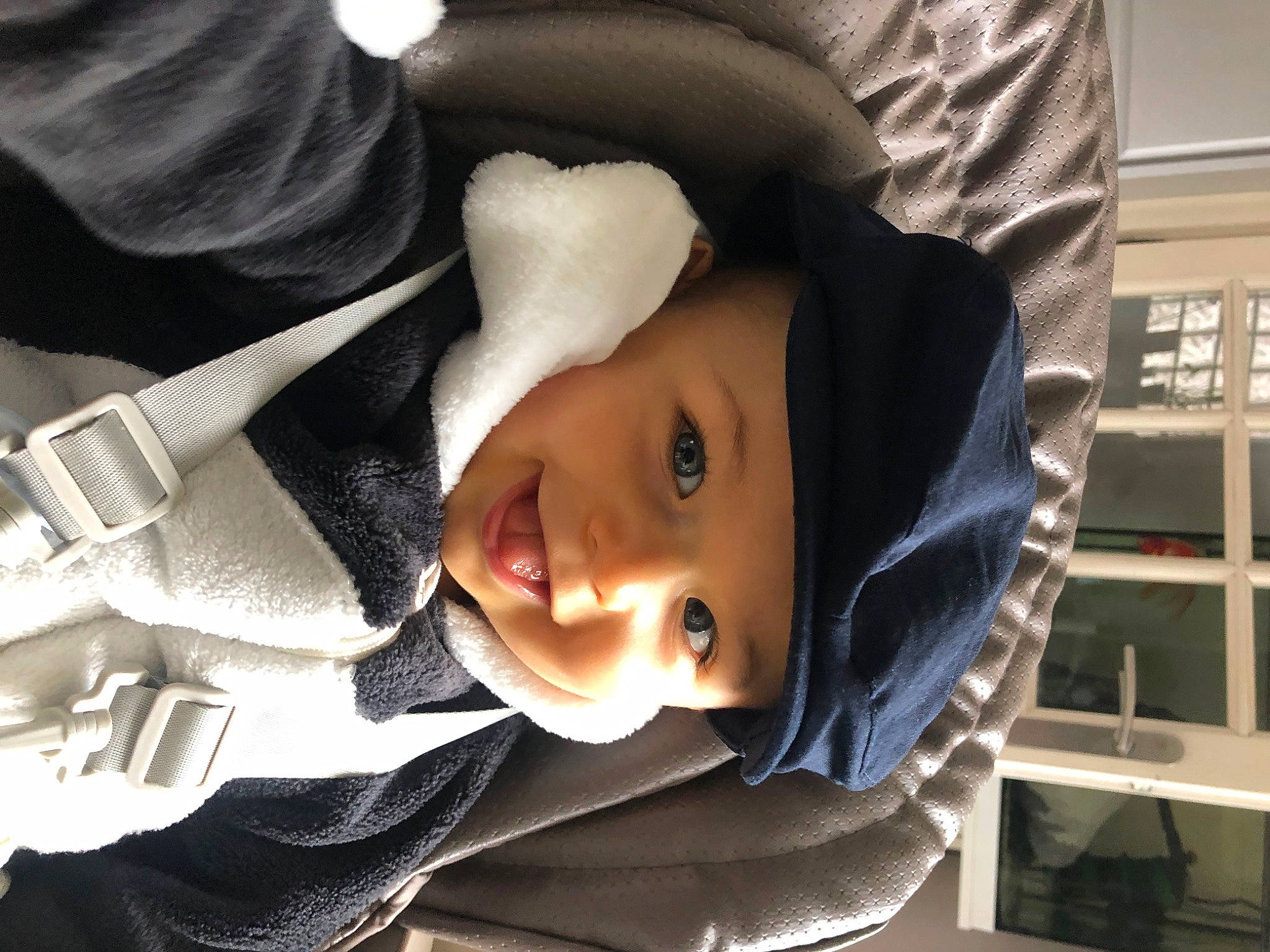 Livio a rejoint le concours — aidez-le/la à gagner de superbes lots ! baby, baby_products, cheek, child, comfort, eye, eyelash, flash_photography, fun, happy, headgear, headwear, jacket, joy, lip, mouth, person, sitting, sleeve, smile