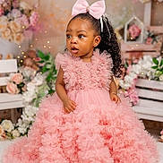 Giovanna joined the competition — help win amazing prizes! adorable, bow, celebration, child, curly_hair, cute, dress, elegant, fashion, floral_background, flower_decor, girl, indoor, party_dress, pink_dress, portrait, posing, smiling, tulle, young_child