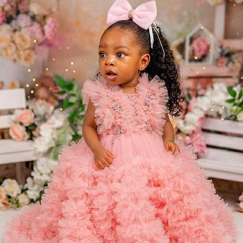 Giovanna joined the competition — help win amazing prizes! adorable, bow, celebration, child, curly_hair, cute, dress, elegant, fashion, floral_background, flower_decor, girl, indoor, party_dress, pink_dress, portrait, posing, smiling, tulle, young_child