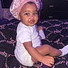 Cimani joined the competition — help win amazing prizes! baby, infant, bed, blanket, bonnet, clothing, cute, face, furniture, indoors, person, portrait, smile, socks, toddler, young_child, home, pink, black, sleepwear