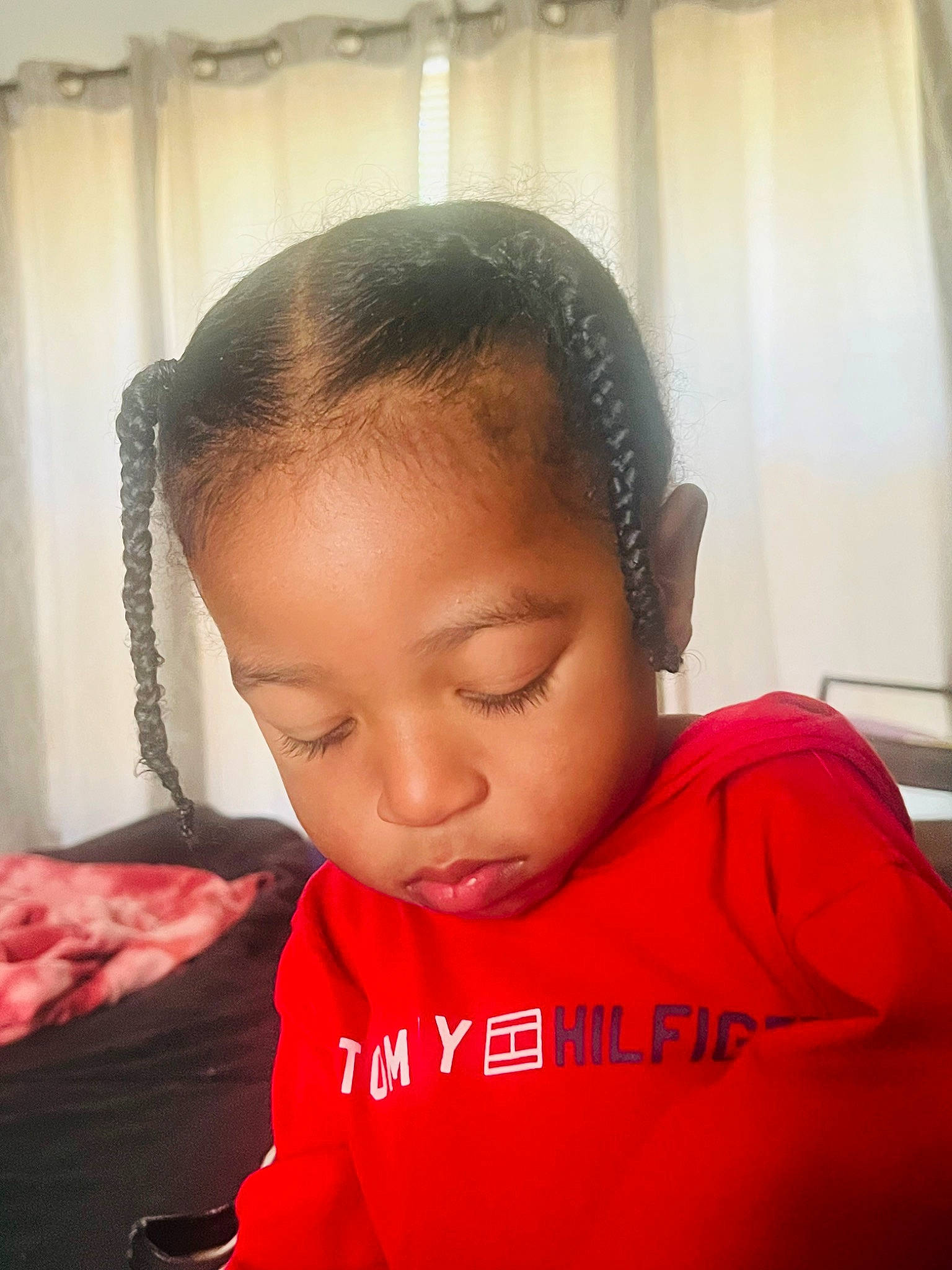 Tyberius is registered to the contest to win money with this photo: audio_equipment, black_hair, braid, cheek, child, curtain, ear, eyebrow, eyelash, forehead, fun, happy, jaw, lip, neck, nose, person, room, skin, t_shirt