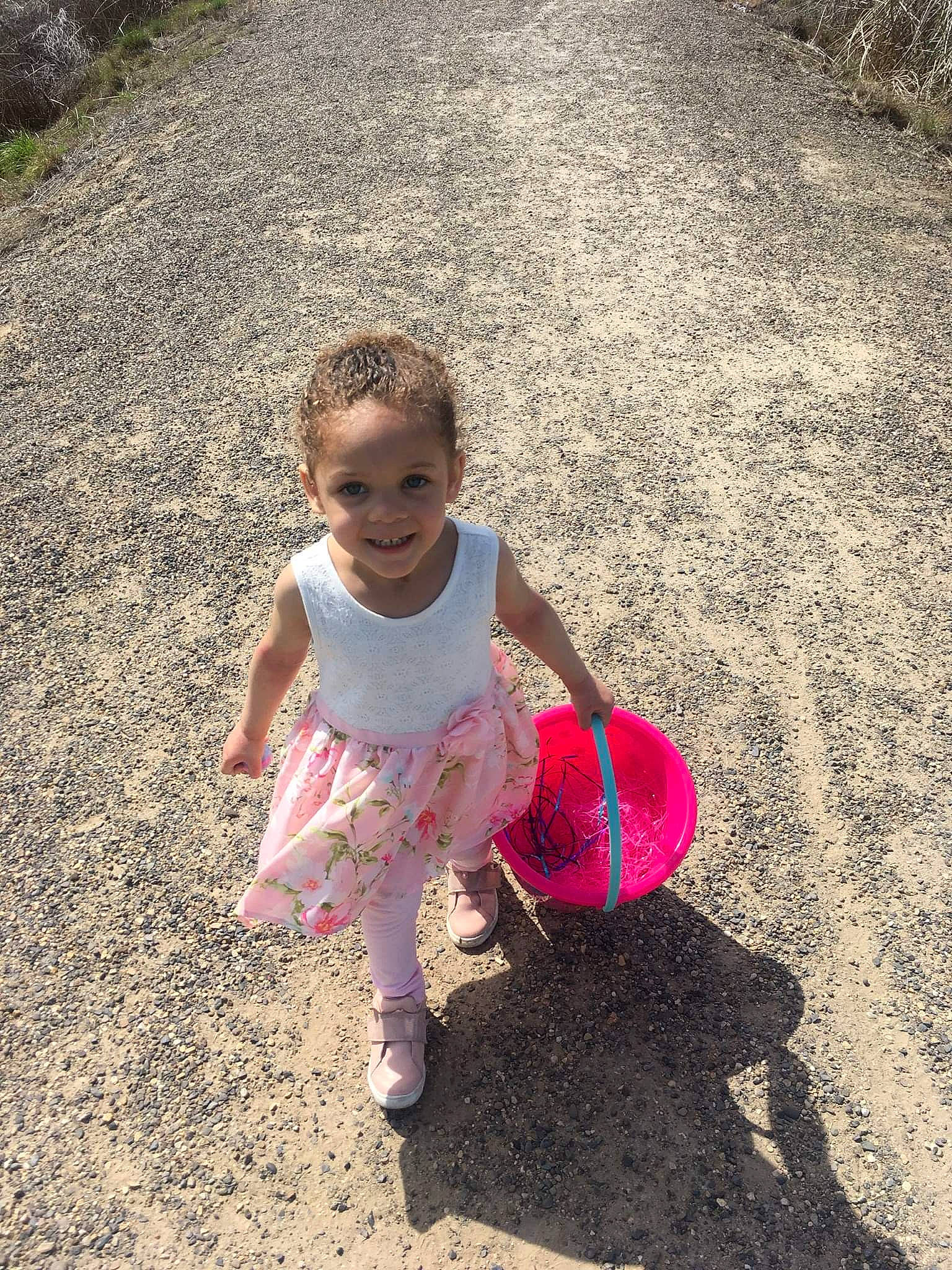 Aubriella Olivia is registered to the contest to win money with this photo: asphalt, barefoot, child, foot, fun, grass, happy, joy, landscape, leaf, leisure, people_in_nature, person, recreation, road, road_surface, sand, sidewalk, sitting, soil