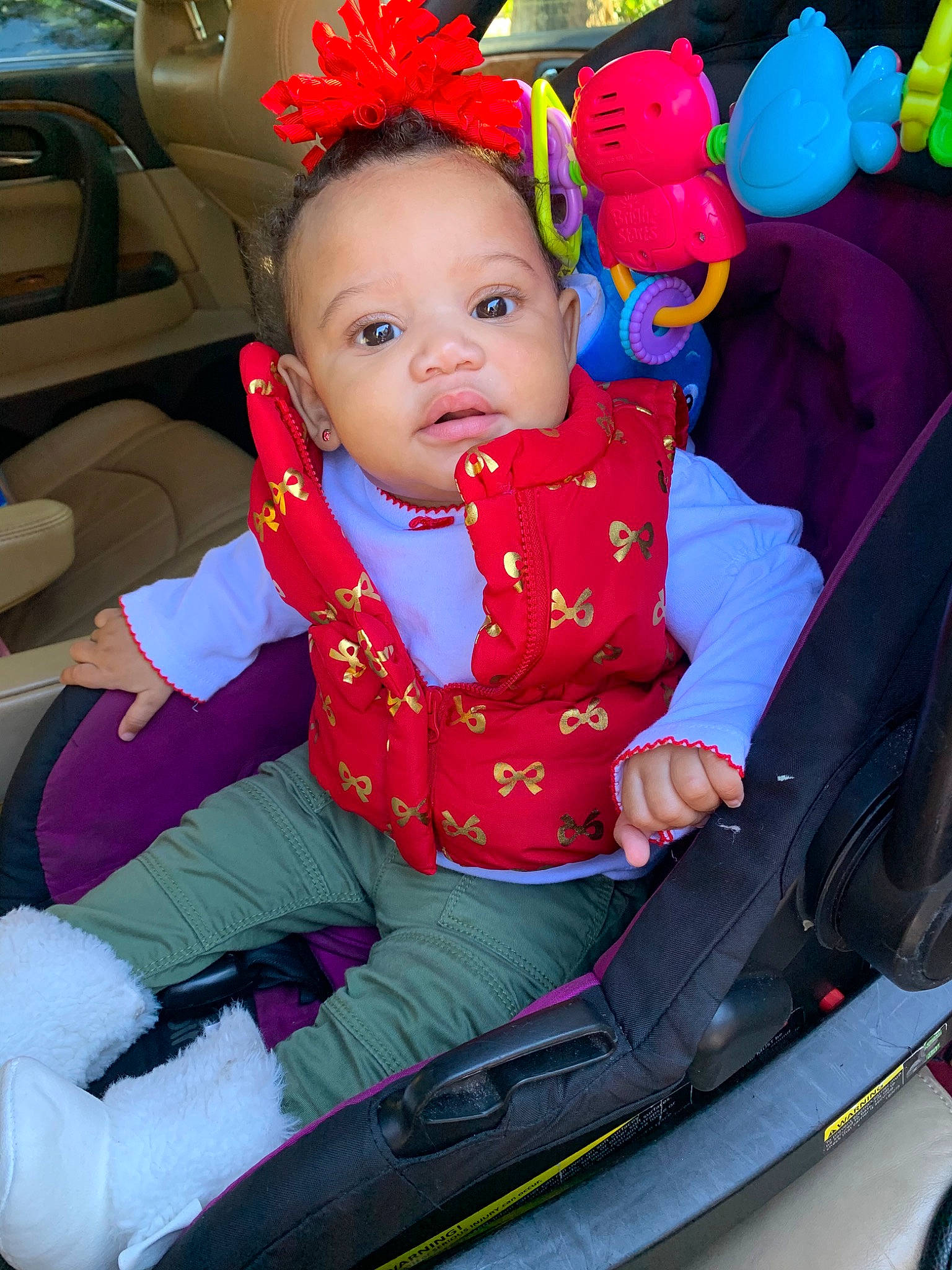 Khloee is registered to the contest to win money with this photo: baby, baby_products, car, car_seat, child, fun, leisure, person, pink, product, toddler, vehicle