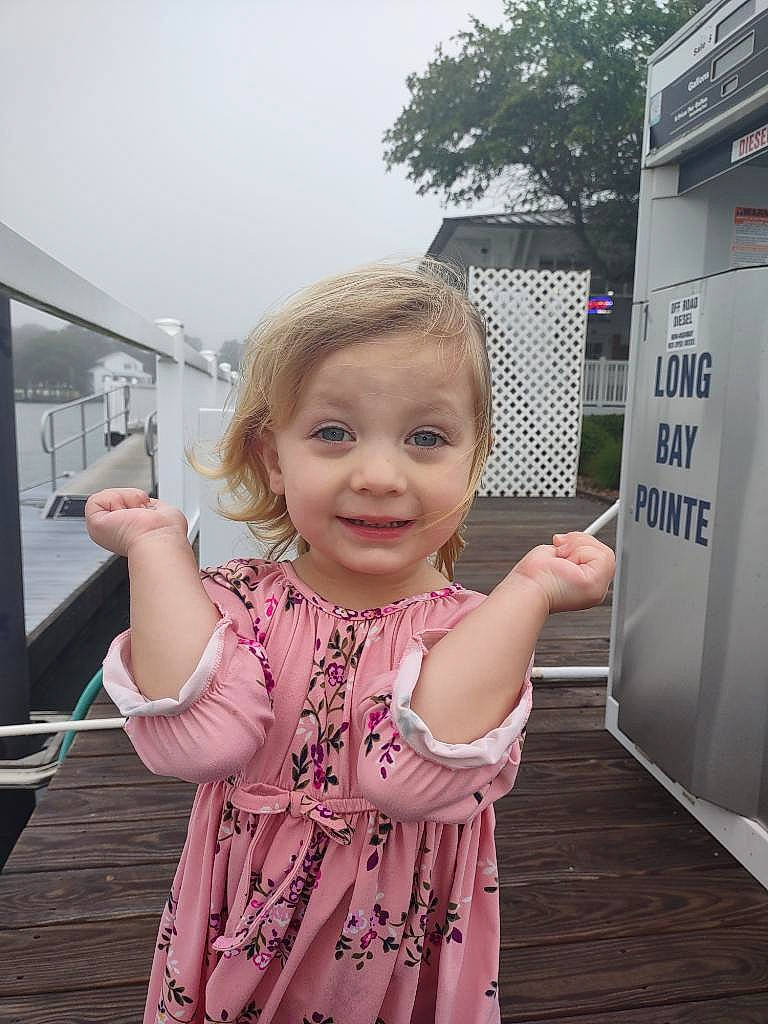 Jazlynn joined the competition — help win amazing prizes! baby, baby_toddler_clothing, child, finger, fun, gas, gesture, hairstyle, happy, joy, magenta, person, skin, sky, sleeve, smile, standing, thumb, toddler, travel