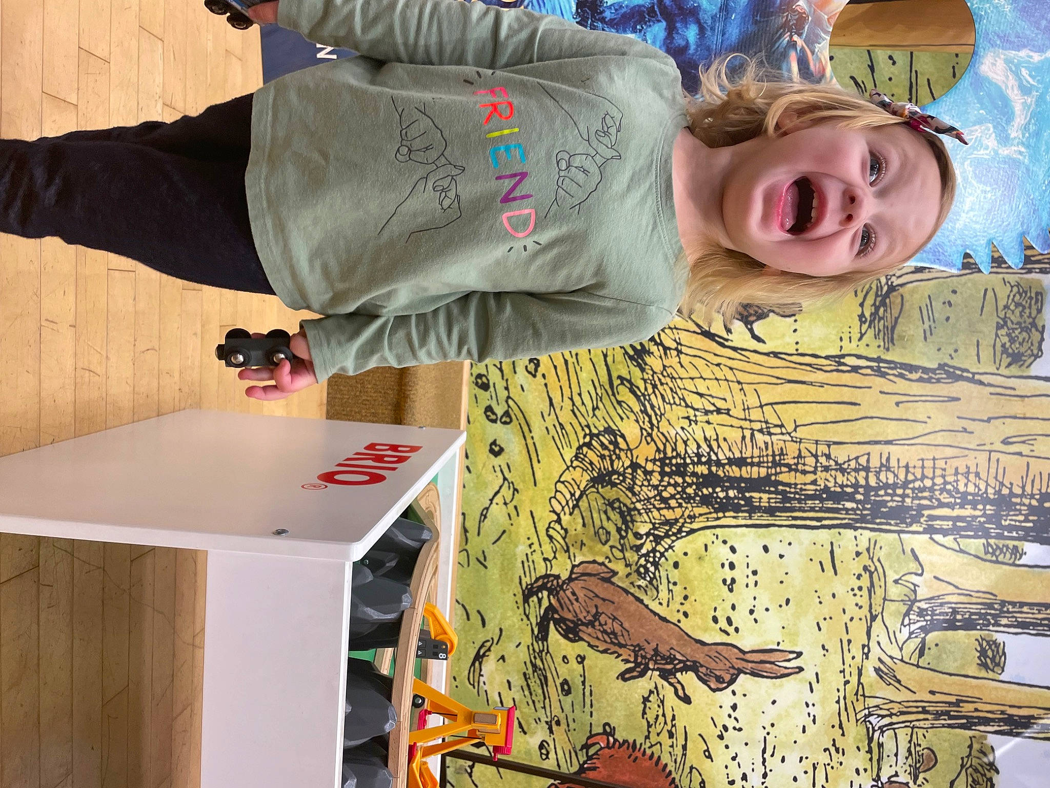 Jazlynn is registered to the contest to win money with this photo: art, artist, denim, eyewear, fashion_design, fun, happy, hat, headwear, pattern, person, room, sleeve, smile, t_shirt, table, textile, tree, visual_arts, wood