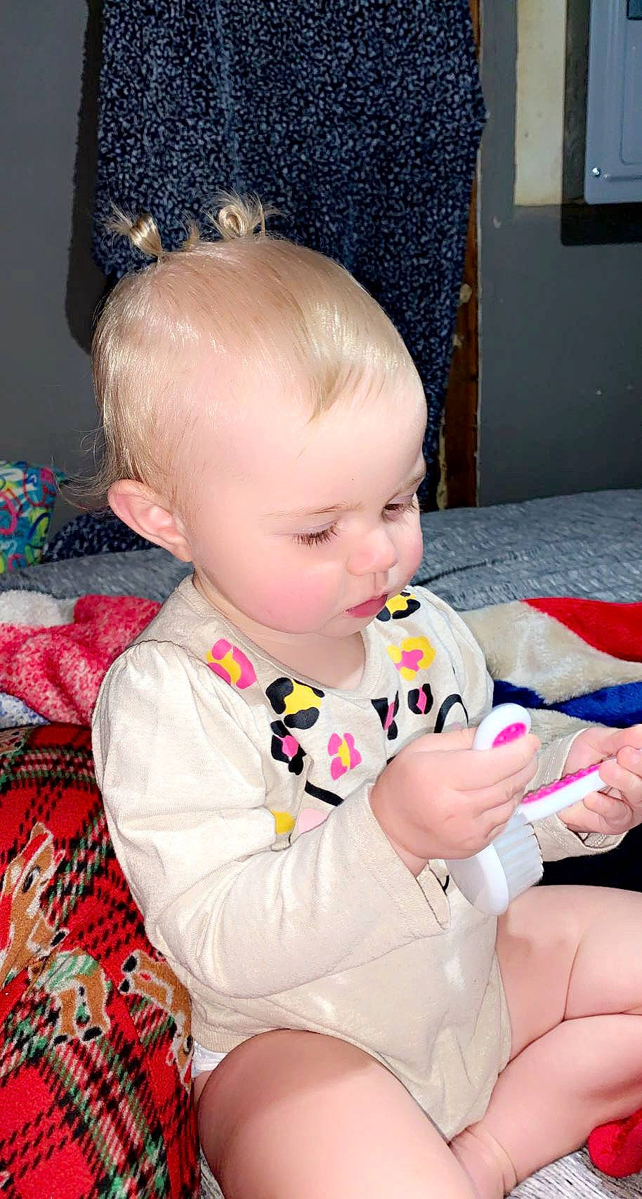 Indy joined the competition — help win amazing prizes! baby, baby_toddler_clothing, blue, cheek, chin, eye, face, fun, head, human_body, iris, lap, mouth, nose, person, pink, skin, sleeve, television, thigh