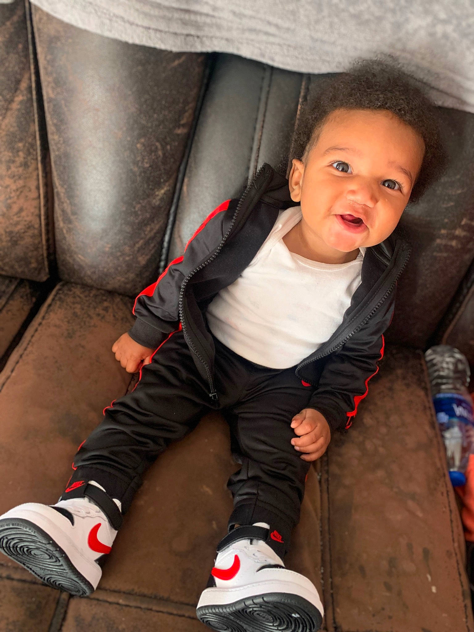 Emmanuel joined the competition — help win amazing prizes! auto_part, automotive_design, baby, baby_carriage, baby_products, car_seat, carmine, chair, child, comfort, cool, fun, human_leg, knee, person, sitting, toddler, vehicle_door, walking_shoe, water_bottle