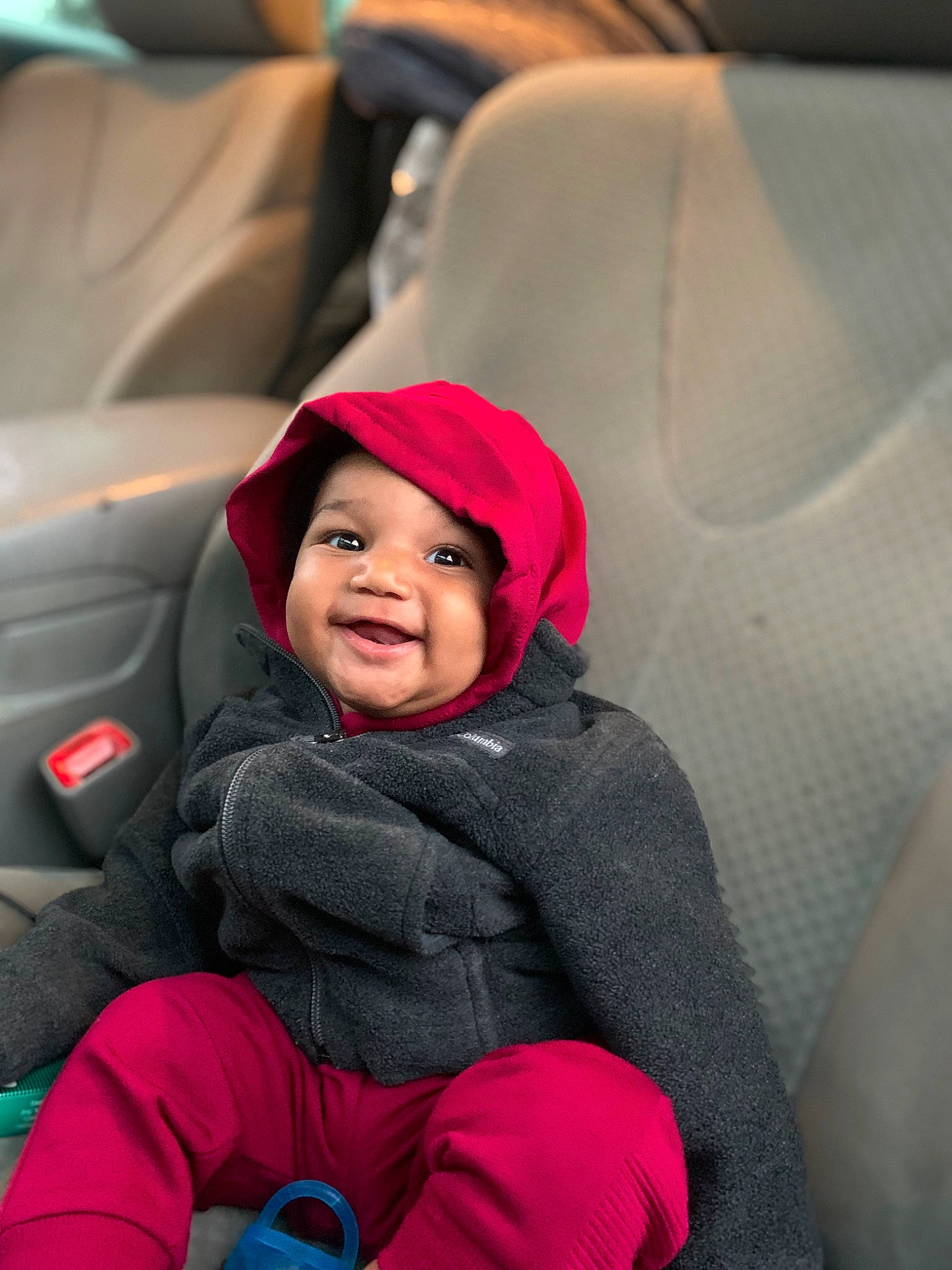 Emmanuel joined the competition — help win amazing prizes! auto_part, automotive_design, baby, baby_carriage, baby_toddler_clothing, car, car_seat, car_seat_cover, child, comfort, face, family_car, headwear, luxury_vehicle, magenta, motor_vehicle, person, sitting, smile, toddler