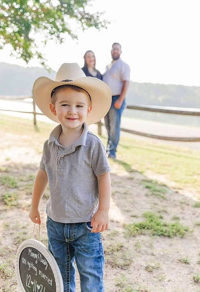 Xander is registered to the contest to win money with this photo: blurred, cap, child, denim, fun, grass, happy, hat, jeans, joy, landscape, leisure, people_in_nature, person, plant, recreation, smile, summer, sun_hat, t_shirt
