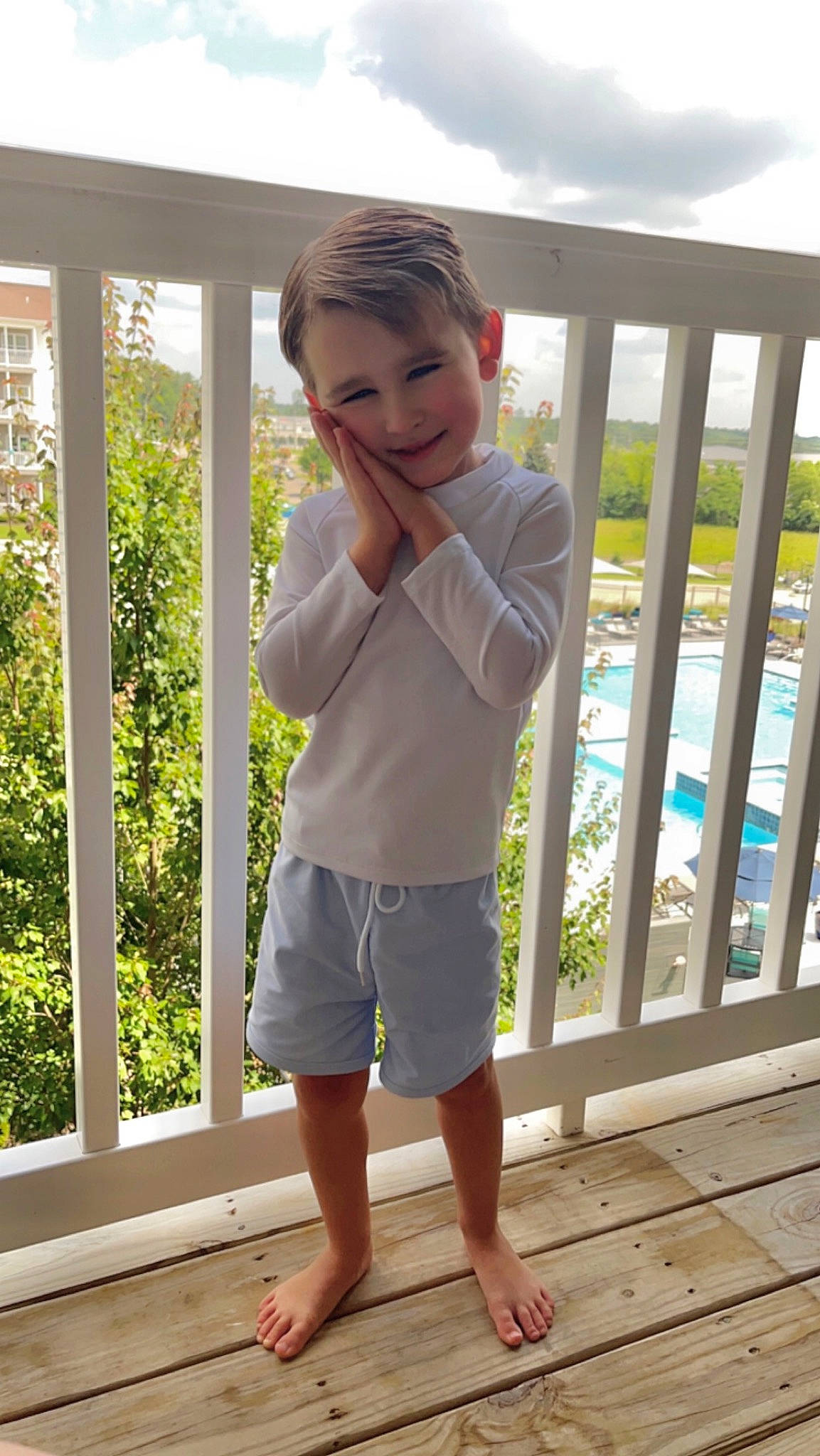 Xander joined the competition — help win amazing prizes! baby_toddler_clothing, child, fence, fun, happy, hardwood, human_leg, joy, leg, leisure, pattern, person, shorts, sky, sleeve, standing, t_shirt, thigh, toddler, waist