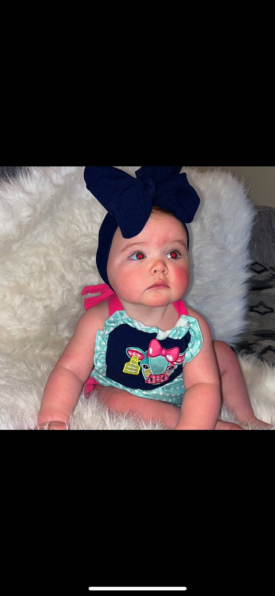 Ila joined the competition — help win amazing prizes! baby, baby_toddler_clothing, beanie, cap, cheek, child, collar, costume_hat, electric_blue, eye, fashion_accessory, flash_photography, happy, hat, headwear, magenta, pattern, person, portrait_photography, sitting