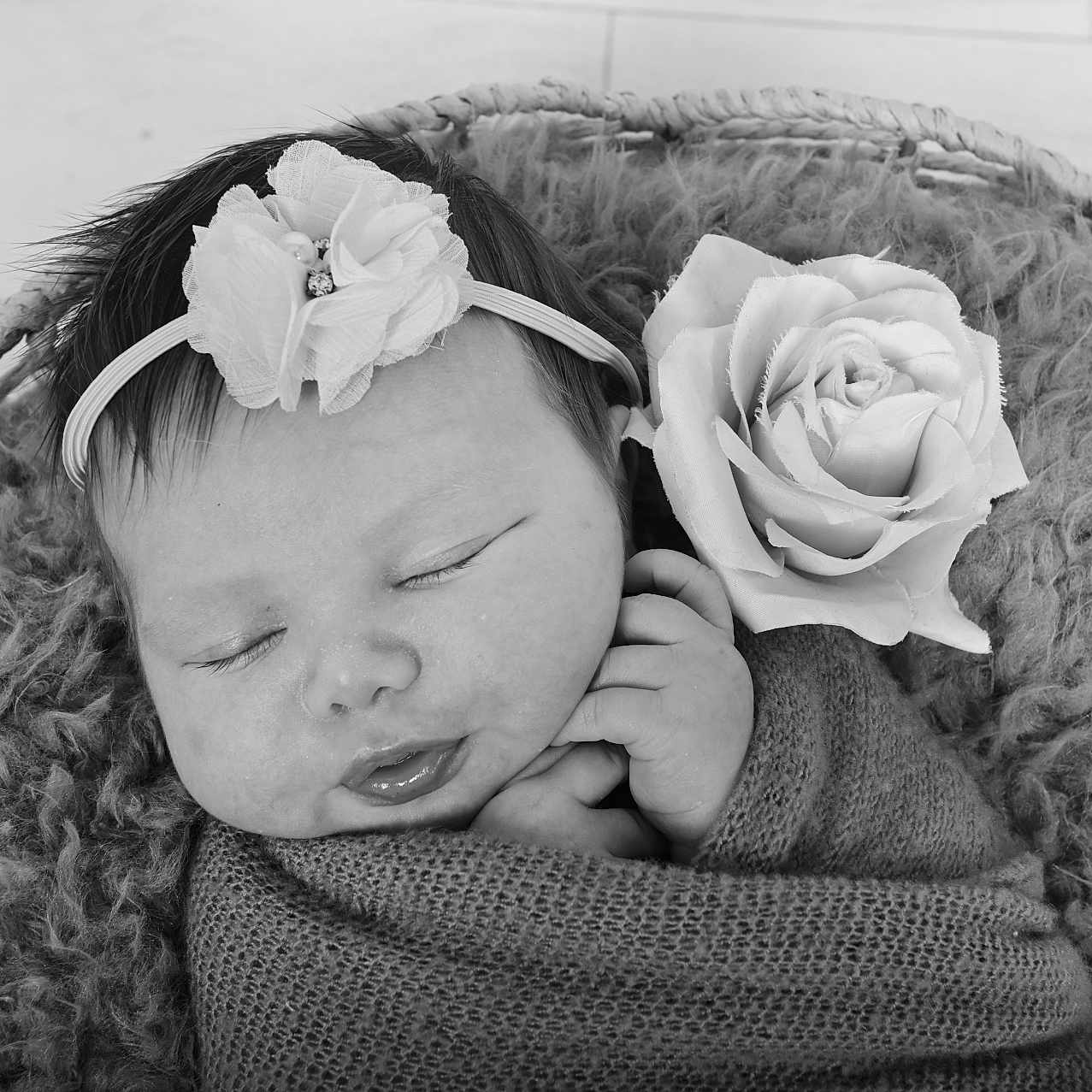 Ida-Rose is registered to the contest to win money with this photo: baby, bed, blanket, clothing, couch, face, flower, flowerarrangement, flowerbouquet, furniture, hat, head, newborn, person, petal, photography, plant, portrait, rose, sleeping