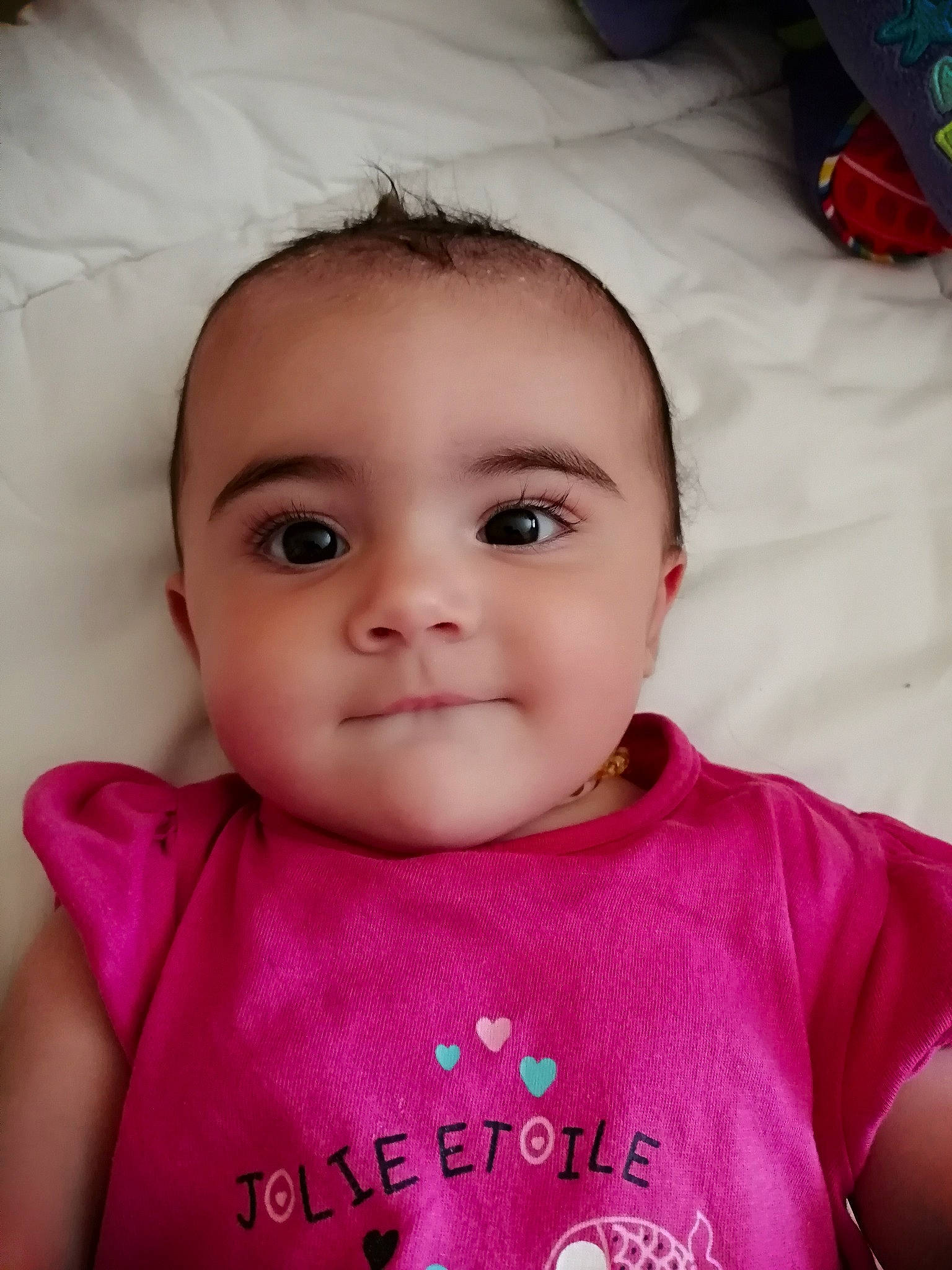 Julia participe au concours pour gagner de l'argent avec cette photo : baby, beauty, cheek, child, chin, eye, eyebrow, face, forehead, happy, head, iris, lip, mouth, neck, nose, person, pink, skin, smile