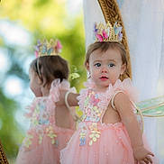 Lilian is registered to the contest to win money with this photo: toddler, child, dress, pink, crown, butterflies, mirror, reflection, fairy_wings, curtain, portrait, costume, outdoor, soft_light, decorative, cute, young_child, fashion, innocence, whimsical
