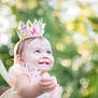 toddler, child, fairy_wings, crown, butterflies, pink_dress, smile, blue_eyes, outdoor, nature, greenery, sunlight, portrait, happy, costume, fantasy, cute, baby, headband, magic