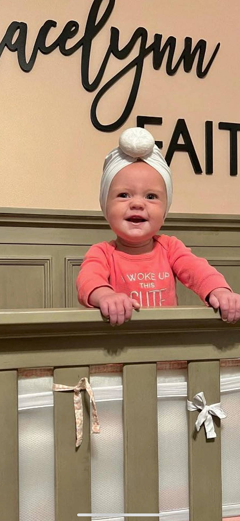 Gracelynn is registered to the contest to win money with this photo: baby, baby_toddler_clothing, cap, cheek, child, clothing, eye, face, fun, gesture, happy, head, headgear, headwear, logo, person, pink, sleeve, smile, t_shirt