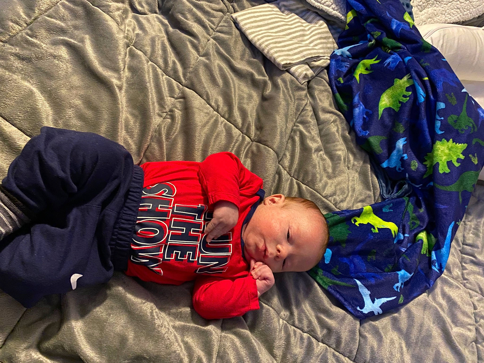 Carsen joined the competition — help win amazing prizes! baby, baby_products, baby_toddler_clothing, child, comfort, electric_blue, fun, grass, hat, human_leg, lap, leg, leisure, linens, person, sitting, t_shirt, textile, thigh, toddler