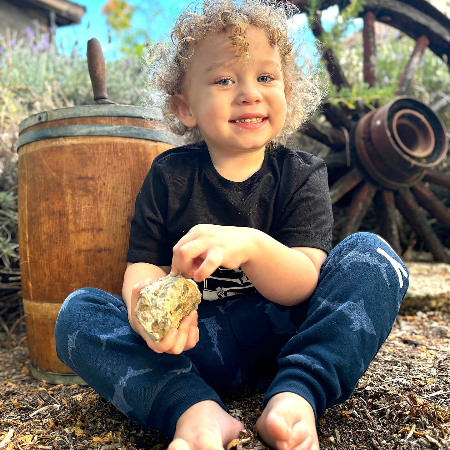 Liam joined the competition — help win amazing prizes! bodypart, boy, child, clothing, face, finger, grass, hand, head, herbal, herbs, jeans, male, outdoors, pants, person, photography, plant, portrait, soil