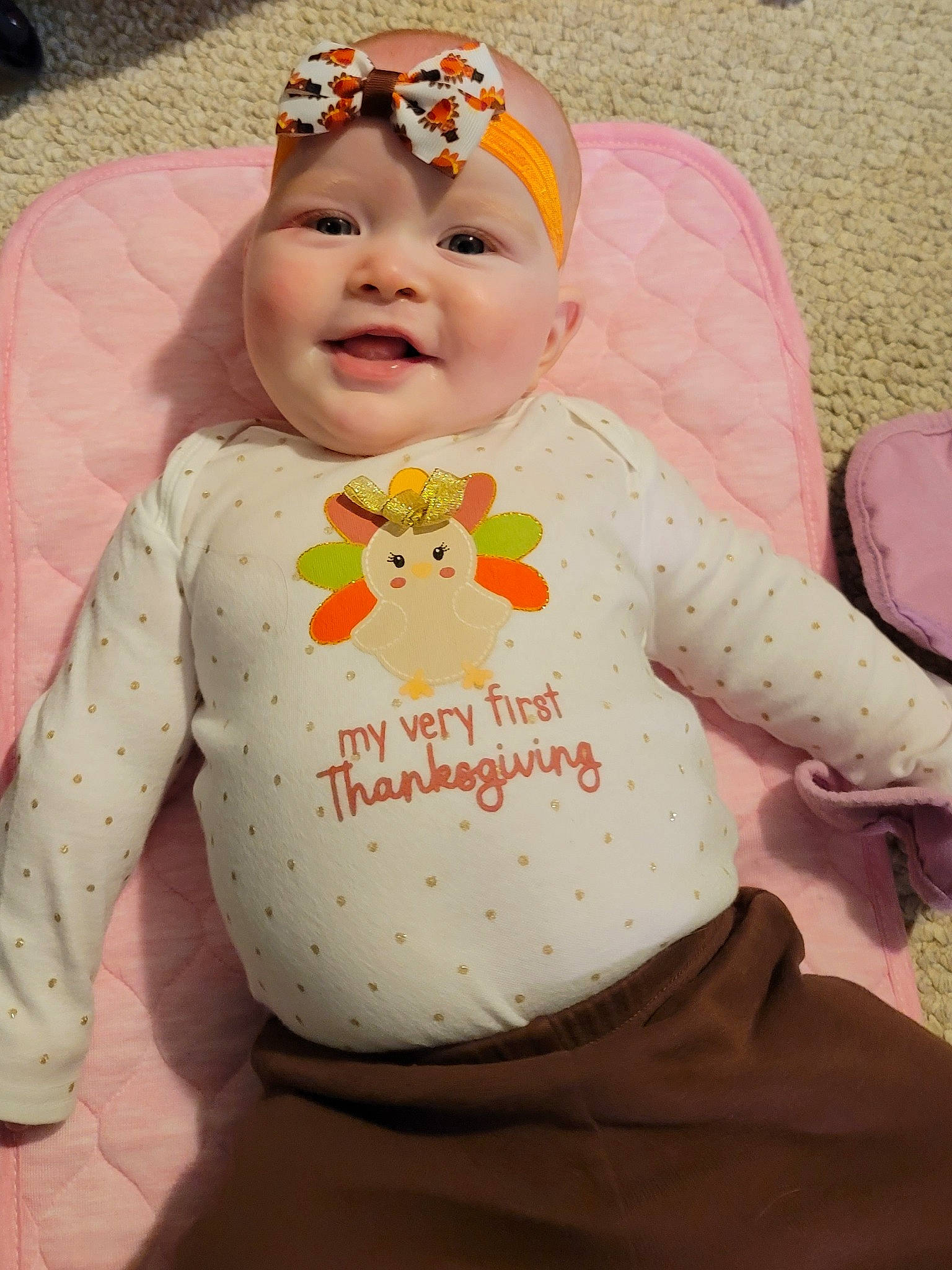 Eliana joined the competition — help win amazing prizes! art, baby, baby_products, baby_toddler_clothing, bib, child, eyewear, face, facial_expression, fun, goggles, happy, head, headgear, headwear, pattern, person, pink, sleeve, smile