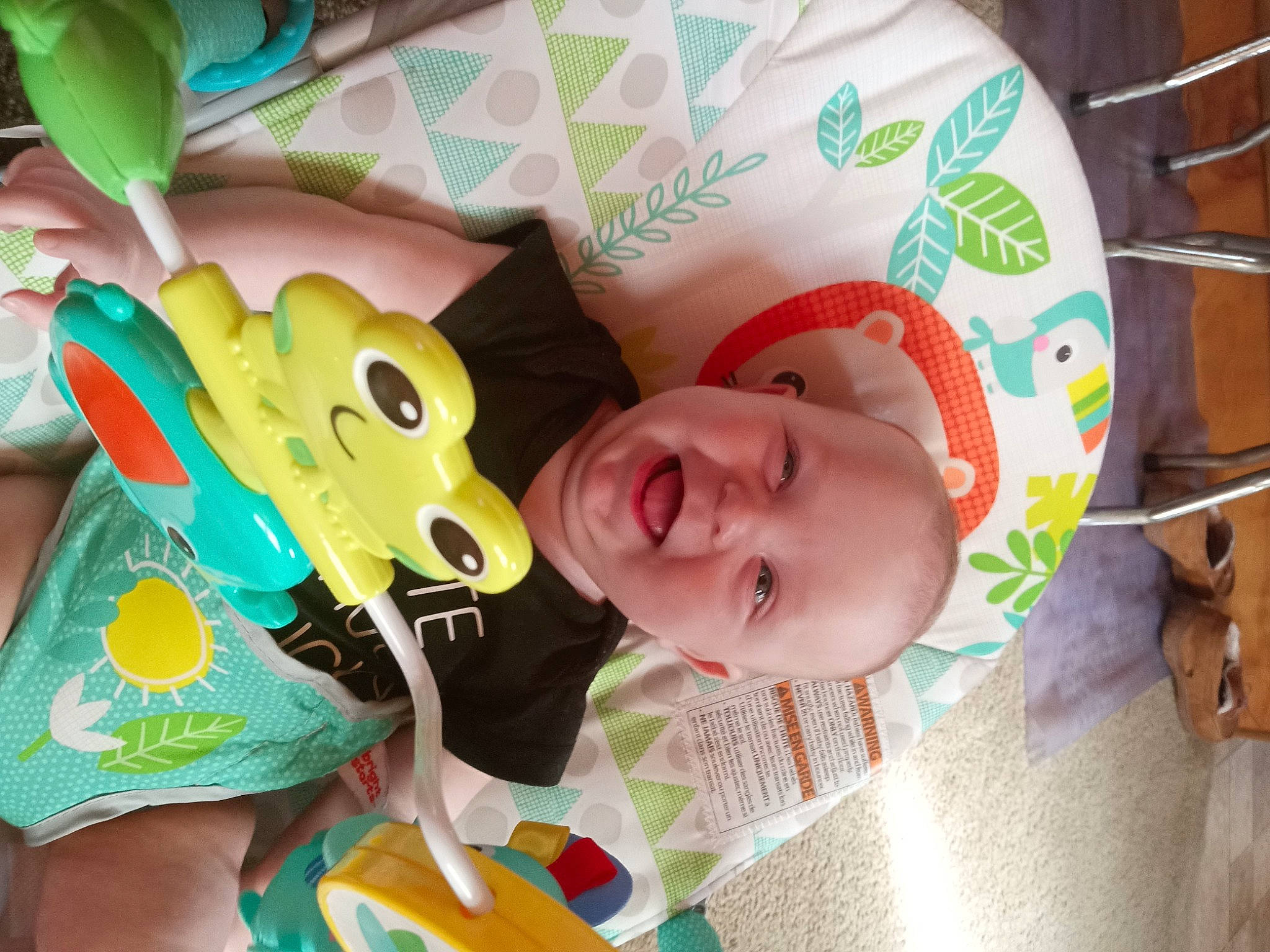 Patrick is registered to the contest to win money with this photo: baby, baby_products, baby_toddler_clothing, baby_toys, child, comfort, face, facial_expression, fun, happy, head, joy, linens, person, product, room, smile, stuffed_toy, toddler