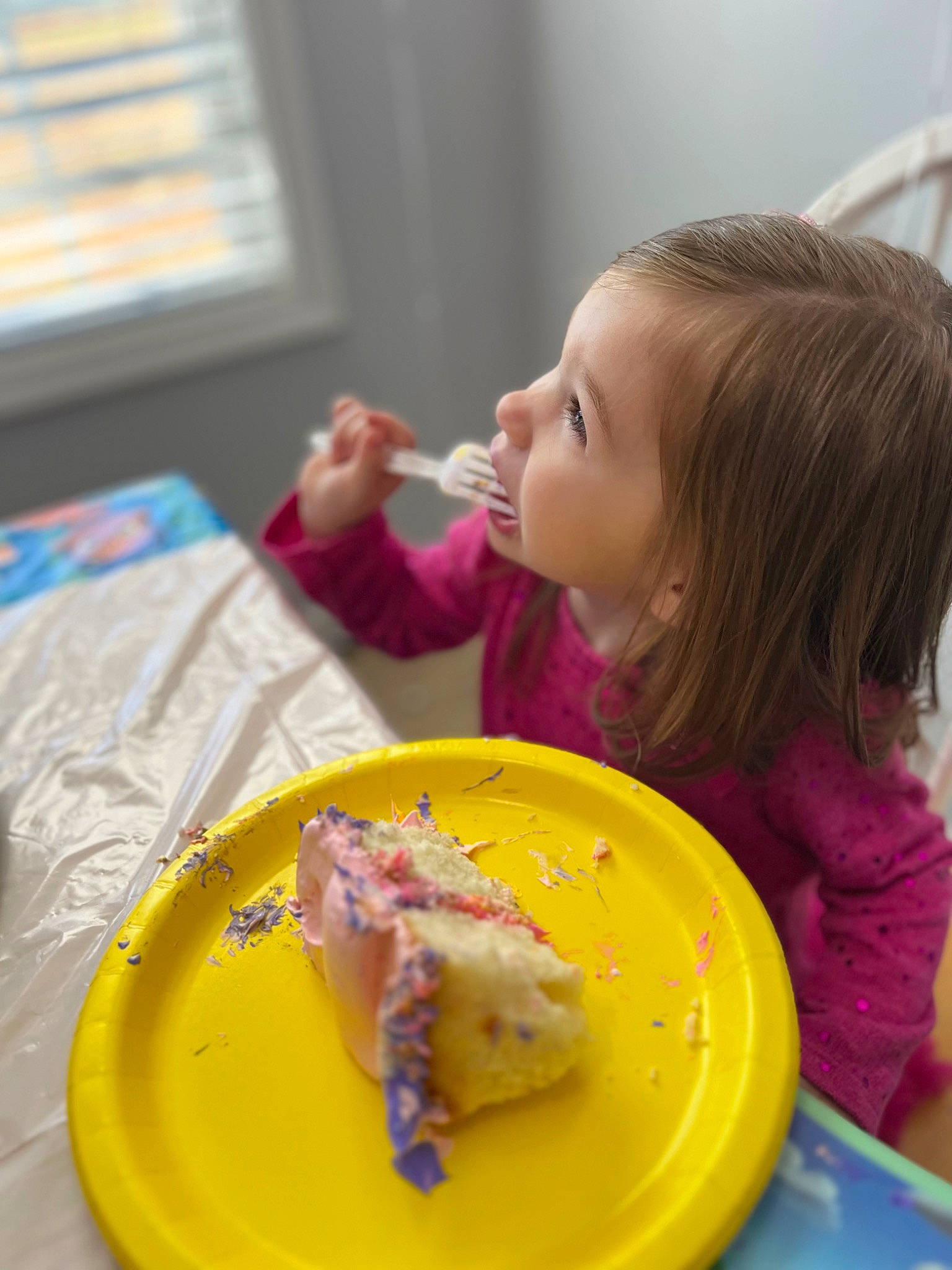 Karley is registered to the contest to win money with this photo: baby, child, comfort_food, cuisine, curtain, dish, dishware, food, food_craving, ingredient, person, plate, recipe, sharing, smile, sweetness, tableware, toddler, window, window_blind