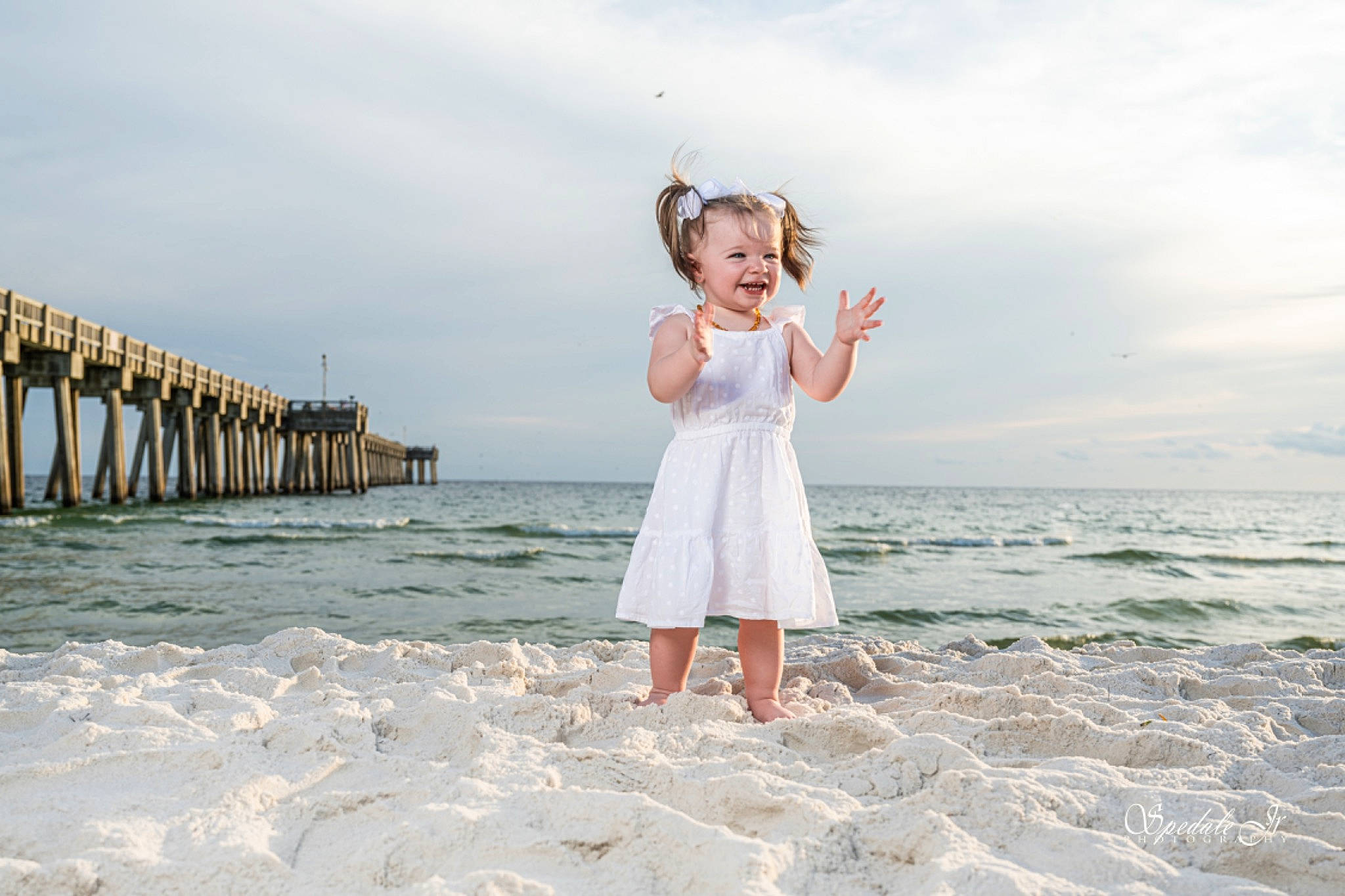 Kinadee is registered to the contest to win money with this photo: azure, barefoot, beach, cloud, dress, flash_photography, gesture, happy, horizon, leisure, morning, people_in_nature, people_on_beach, person, shore, skin, sky, summer, toddler, travel