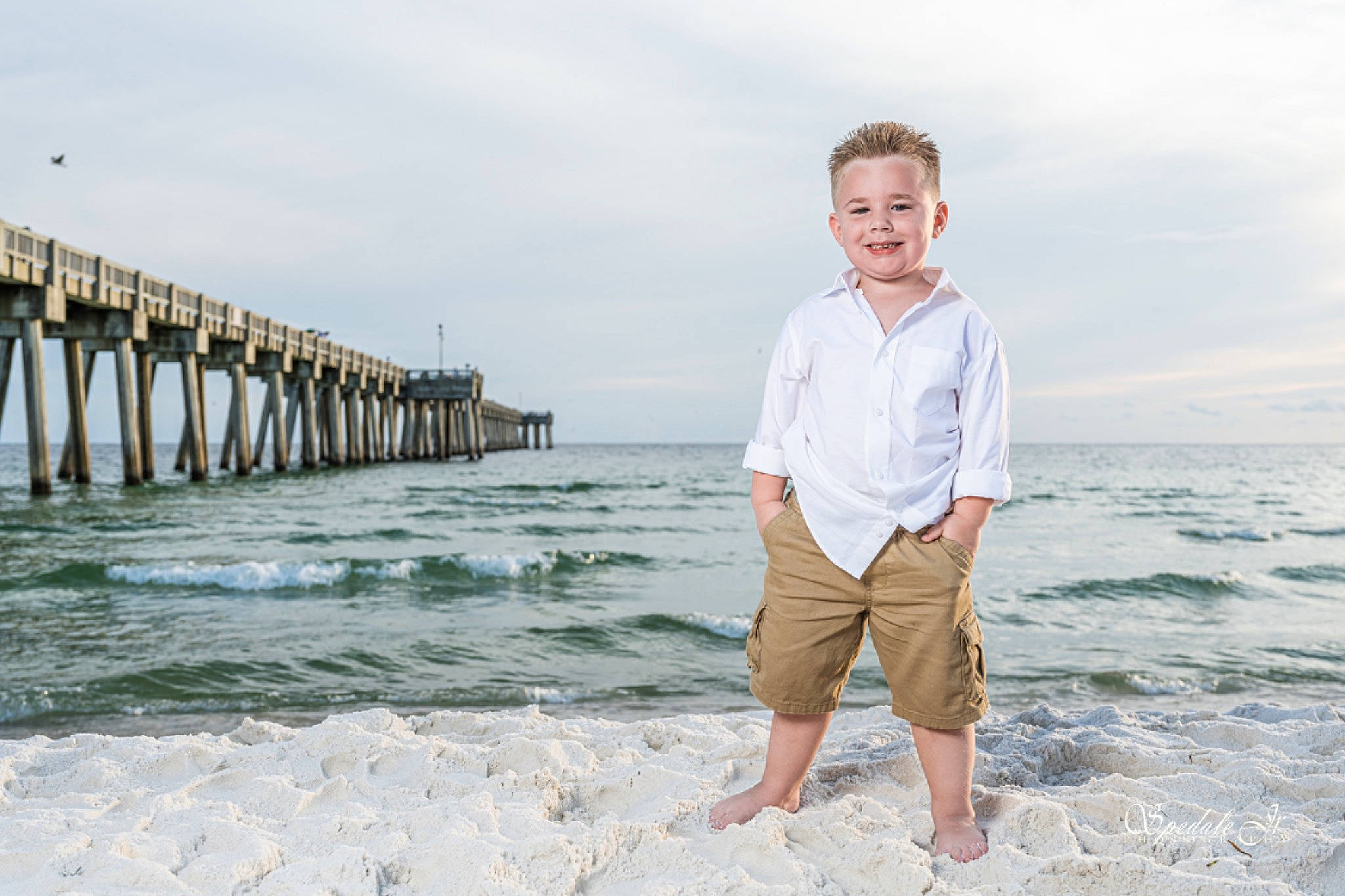 Korbin joined the competition — help win amazing prizes! beach, body_of_water, cloud, coastal_and_oceanic_landforms, flash_photography, fun, happy, horizon, joy, leisure, people_in_nature, people_on_beach, person, sand, shore, shorts, sky, sleeve, smile, travel