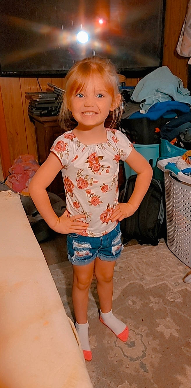 Aalayah is registered to the contest to win money with this photo: blue, child, electric_blue, facial_expression, fun, happy, human_leg, iris, jean_short, joint, joy, knee, leg, luggage_and_bags, person, shorts, skin, smile, thigh, toddler