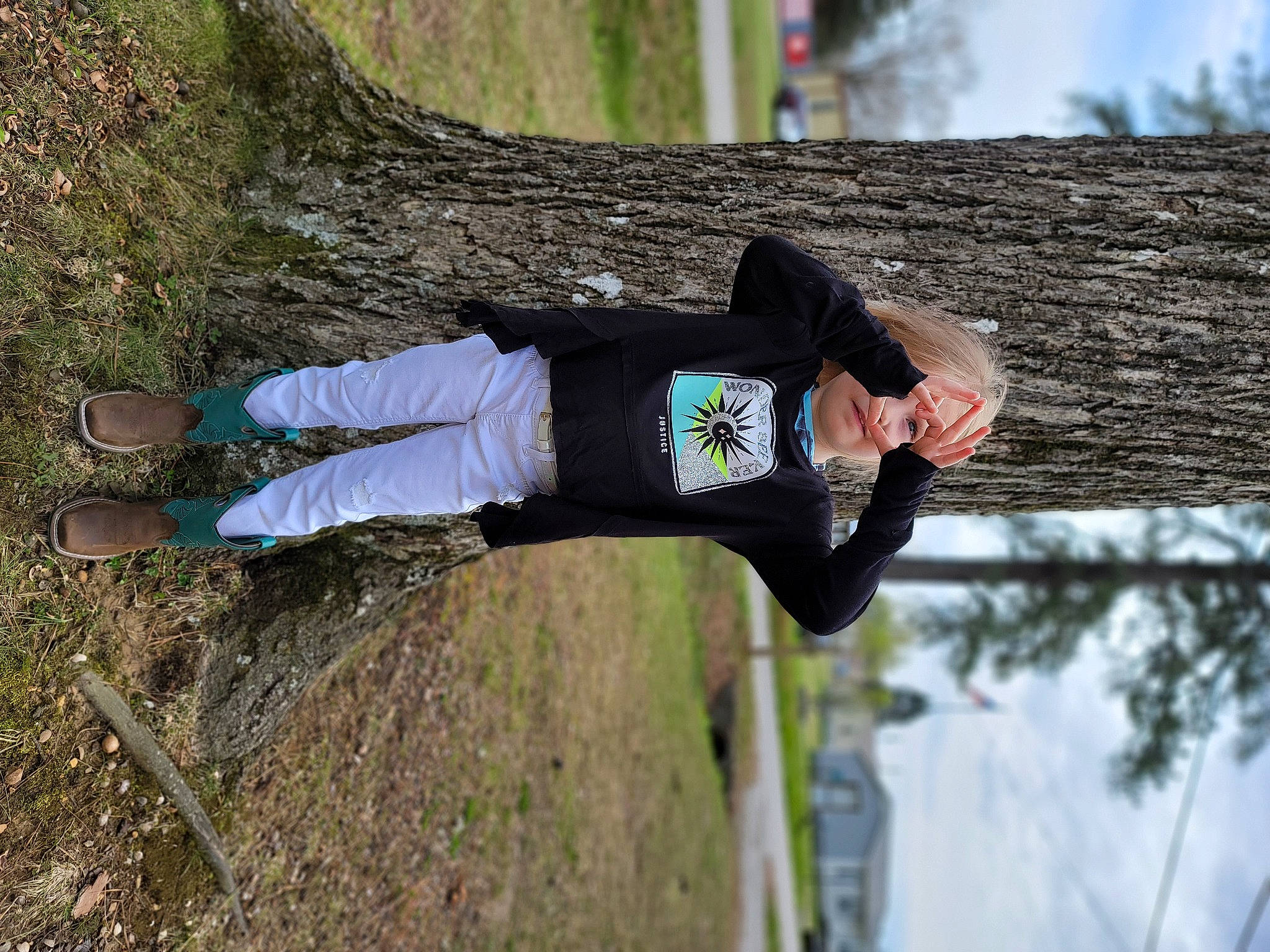 Aalayah is registered to the contest to win money with this photo: active_pants, boot, footwear, fun, grass, leisure, people_in_nature, person, plant, recreation, shoe, sky, soil, street_fashion, thigh, tree, walking_shoe