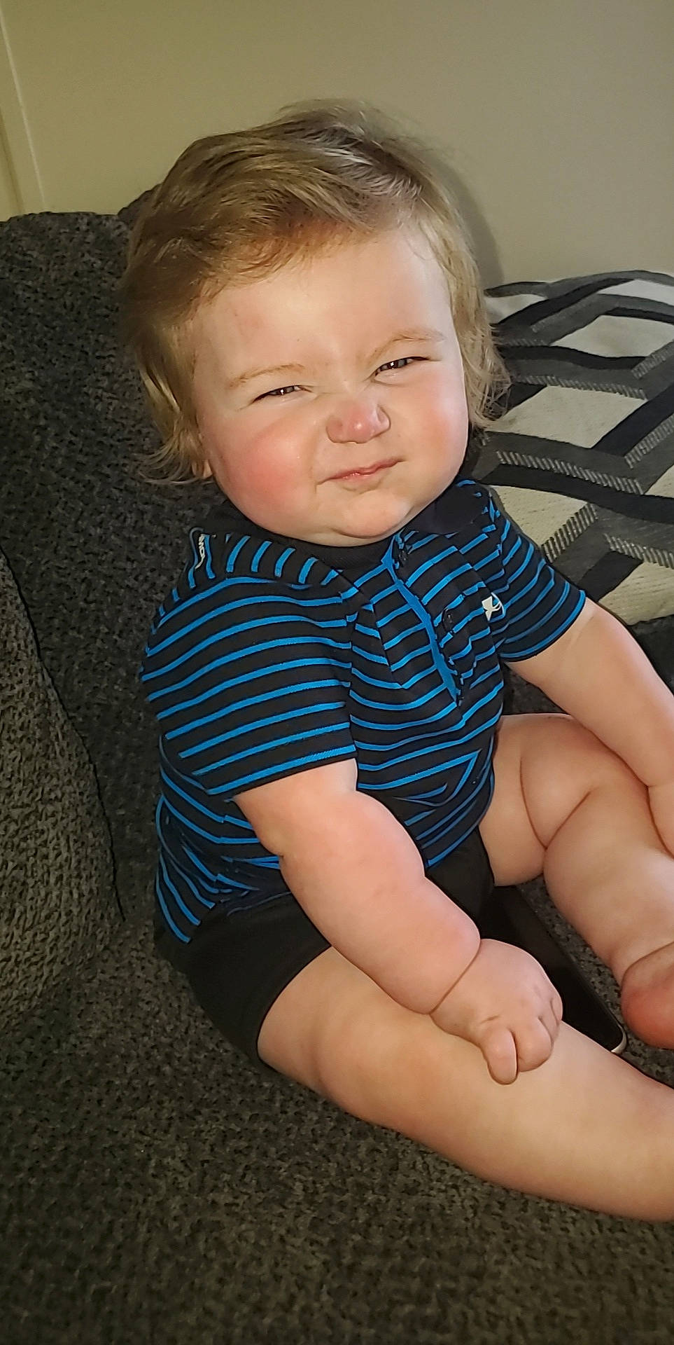 Jami'Son Rye'Ker is registered to the contest to win money with this photo: arm, baby, cheek, child, finger, leg, person, sitting, skin, toddler