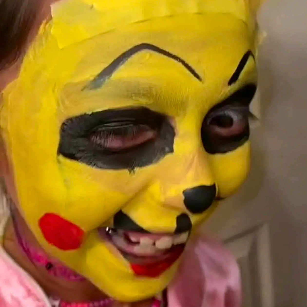 Zoey is registered to the contest to win money with this photo: art, cheek, close_up, entertainment, event, eye, eyebrow, eyelash, forehead, fun, happy, head, headgear, jaw, mouth, nose, performing_arts, sculpture, smile, yellow