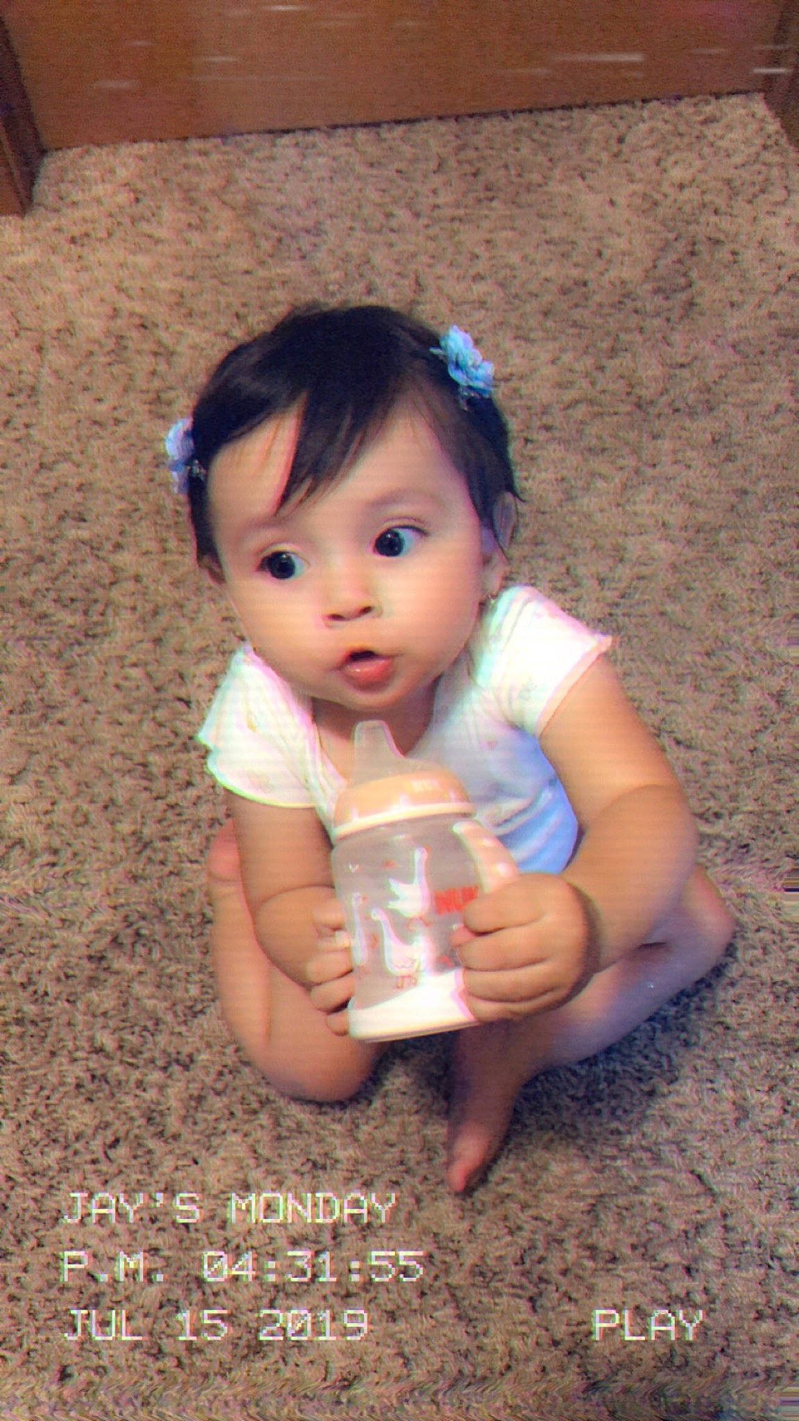 Cataleya is registered to the contest to win money with this photo: baby, beauty, child, daughter, eye, fun, happy, iris, person, sitting, skin, smile, toddler