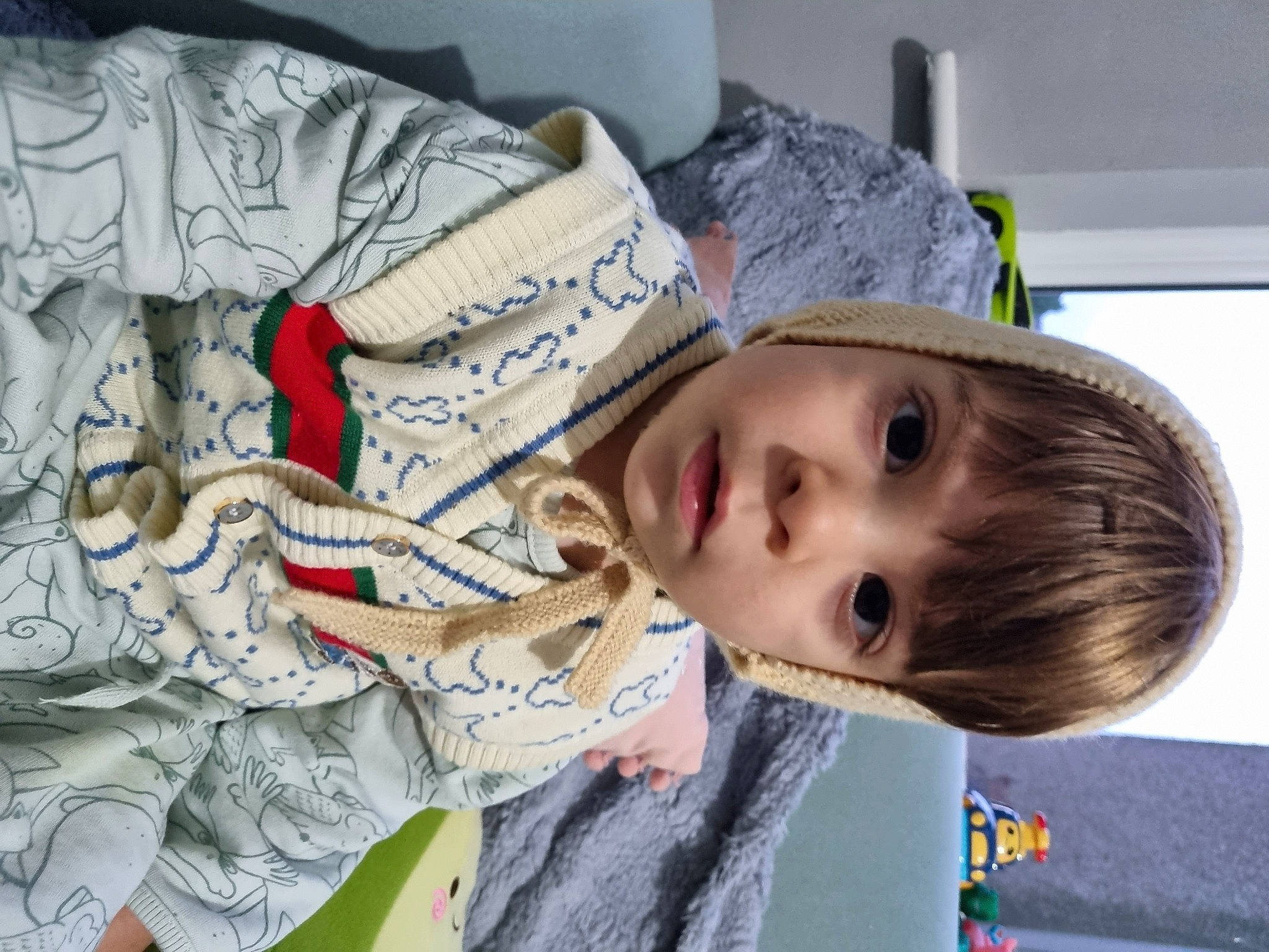 Dominic joined the competition — help win amazing prizes! carmine, cheek, child, comfort, fun, fur, happy, hat, linens, nose, pattern, person, selfie, sleeve, toddler, tree, wood