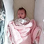 Maddison is registered to the contest to win money with this photo: baby, blanket, bassinet, pink, white, infant, cozy, cute, newborn, sleepy, soft, portrait, wrapped, clothing, face, expression, indoors, resting, child, bed