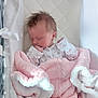 Maddison joined the competition — help win amazing prizes! baby, newborn, sleeping, blanket, pink, bassinet, crib, infant, clothing, cozy, knitted, soft, peaceful, cute, face, head, person, rest, indoors, toddler