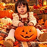 Georgina joined the competition — help win amazing prizes! child, baby, toddler, portrait, smiling, autumn, fall, pumpkin, jack_o_lantern, maple_leaves, orange, plaid_dress, bow, boots, sitting, outdoor, seasonal, harvest, cozy, decorations